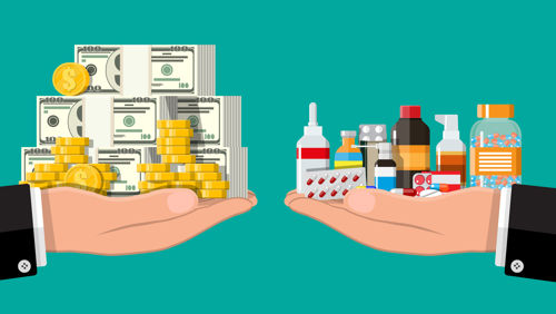 Een hand met geld en een hand met medicijnen Een hand met geld en een hand met medicijnen