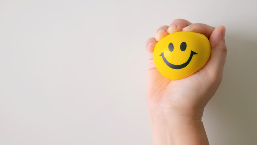 Anti-stressbal smiley om met stress en werkdruk om te gaan Anti-stressbal smiley om met stress en werkdruk om te gaan